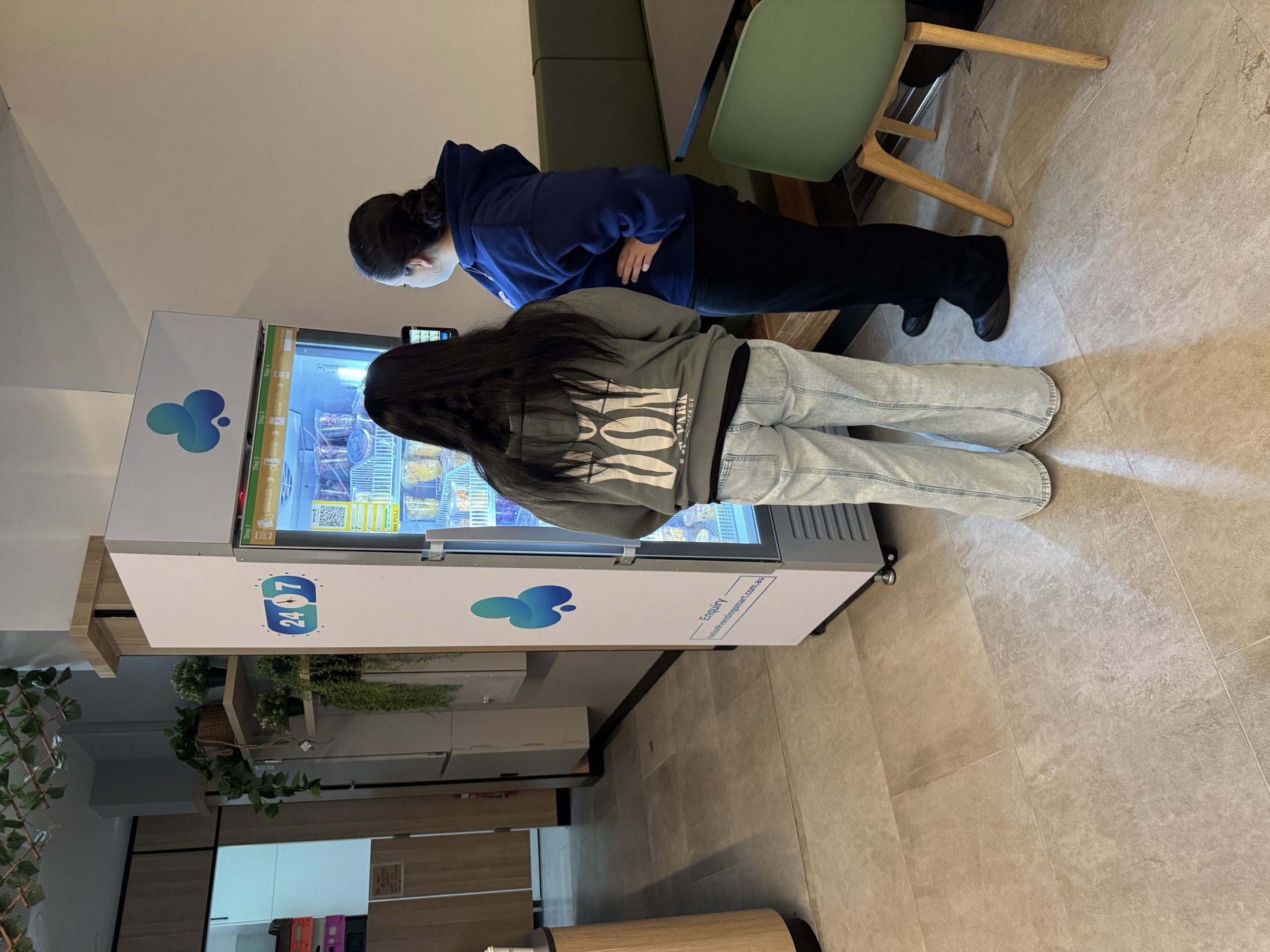 People checking a Perkd smart cabinet in a live venue